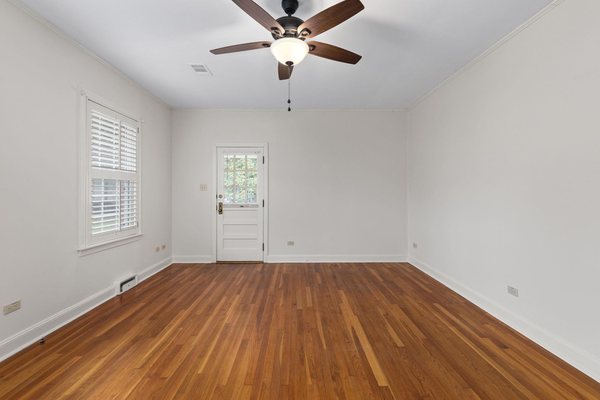 1906 Willow Road Corinth, MS 38834 - Photo 17 of 40 wooden floor in an empty room with a window