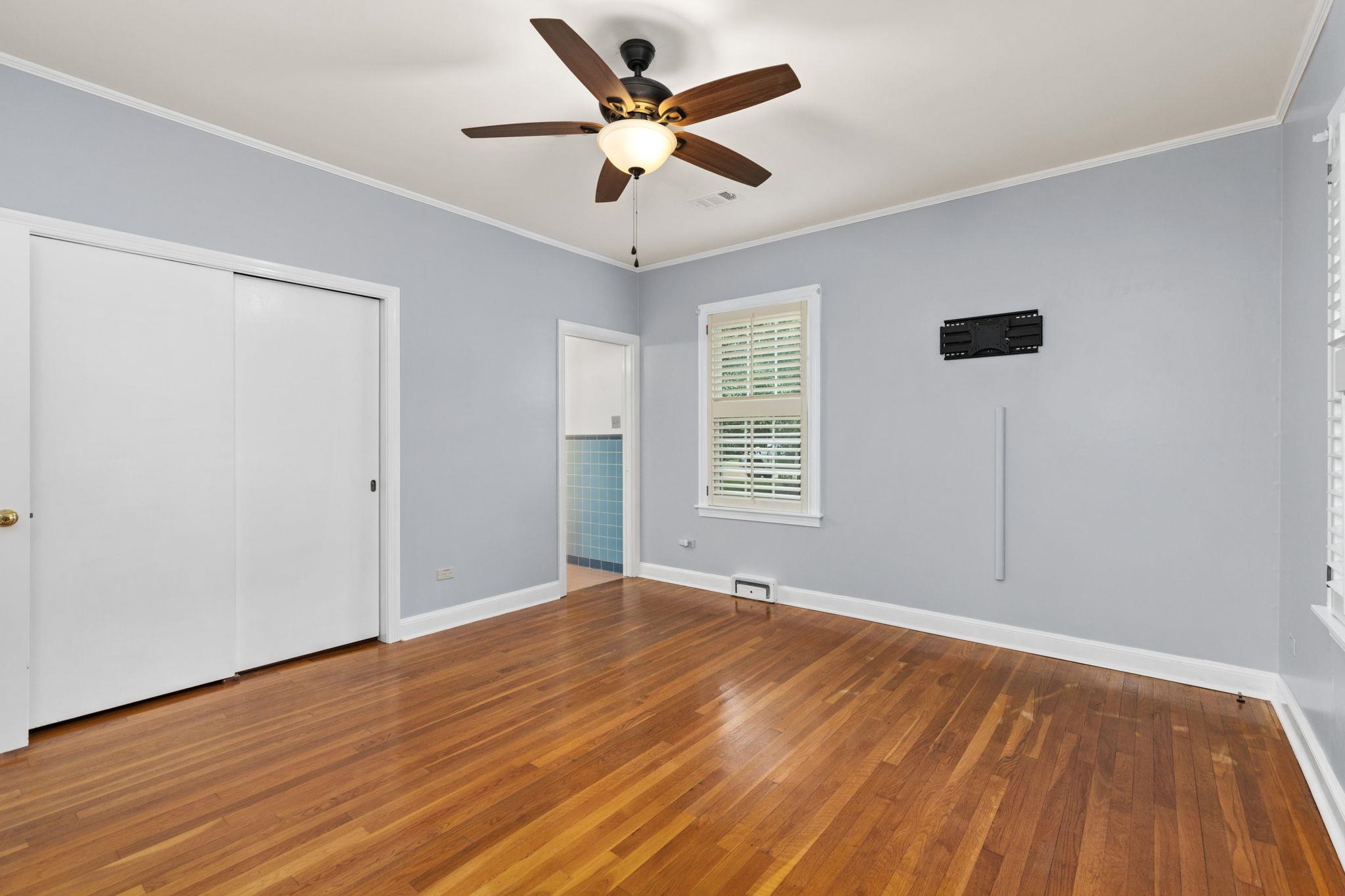 1906 Willow Road Corinth, MS 38834 - Photo 24 of 40 wooden floor in an empty room with a window