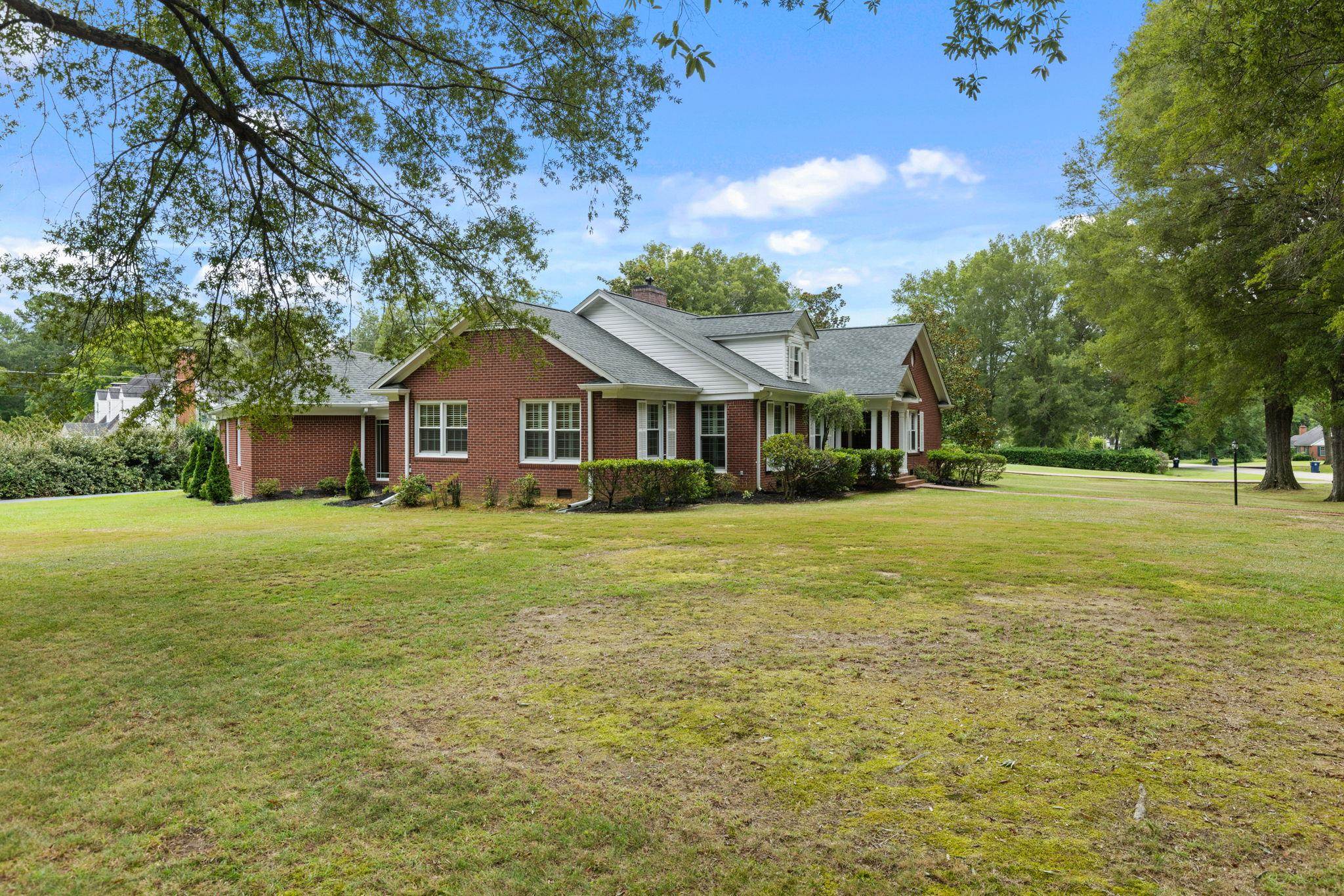 1906 Willow Road Corinth, MS 38834 - Photo 27 of 40 a front view of a house with a garden