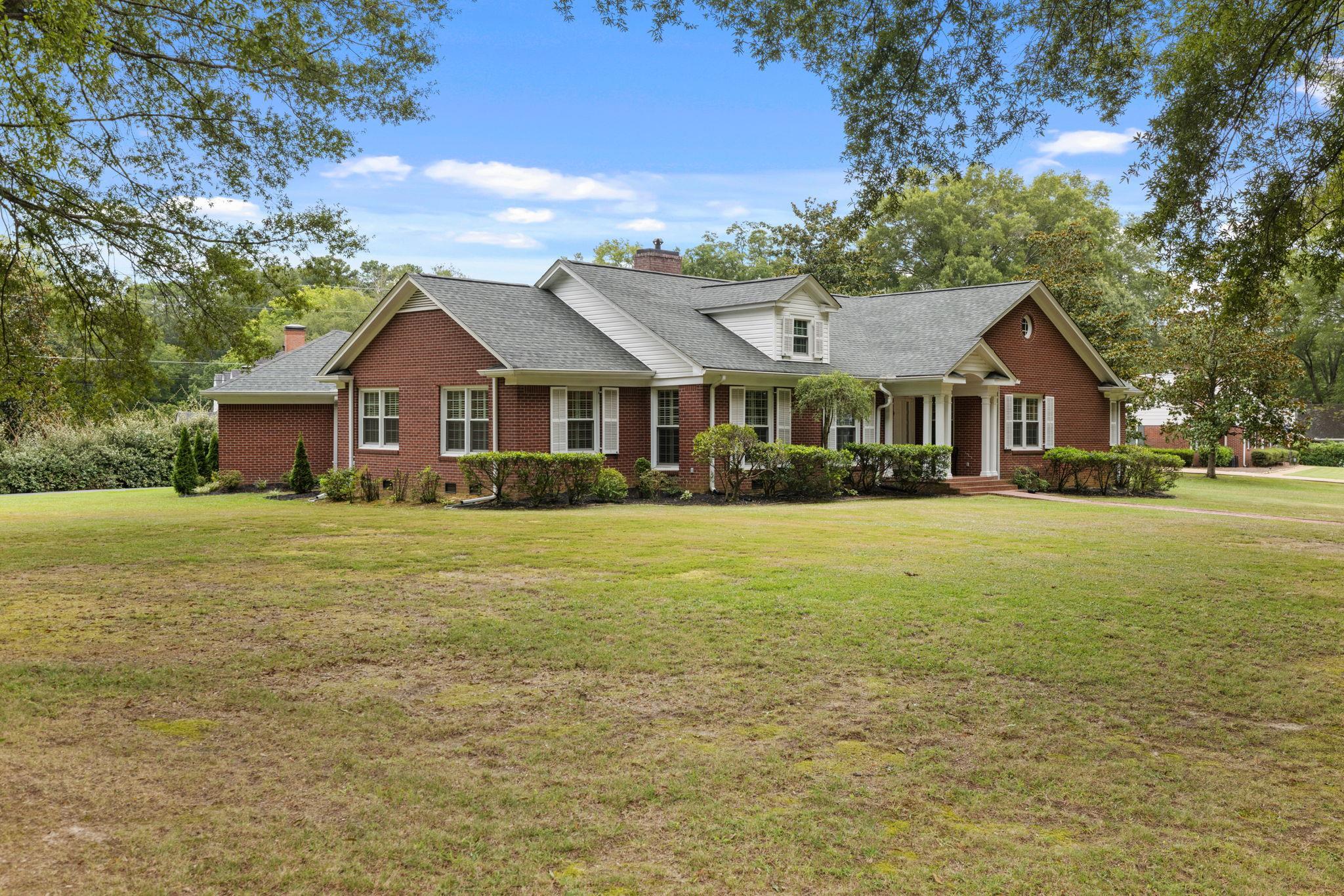 1906 Willow Road Corinth, MS 38834 - Photo 28 of 40 a front view of a house with a yard