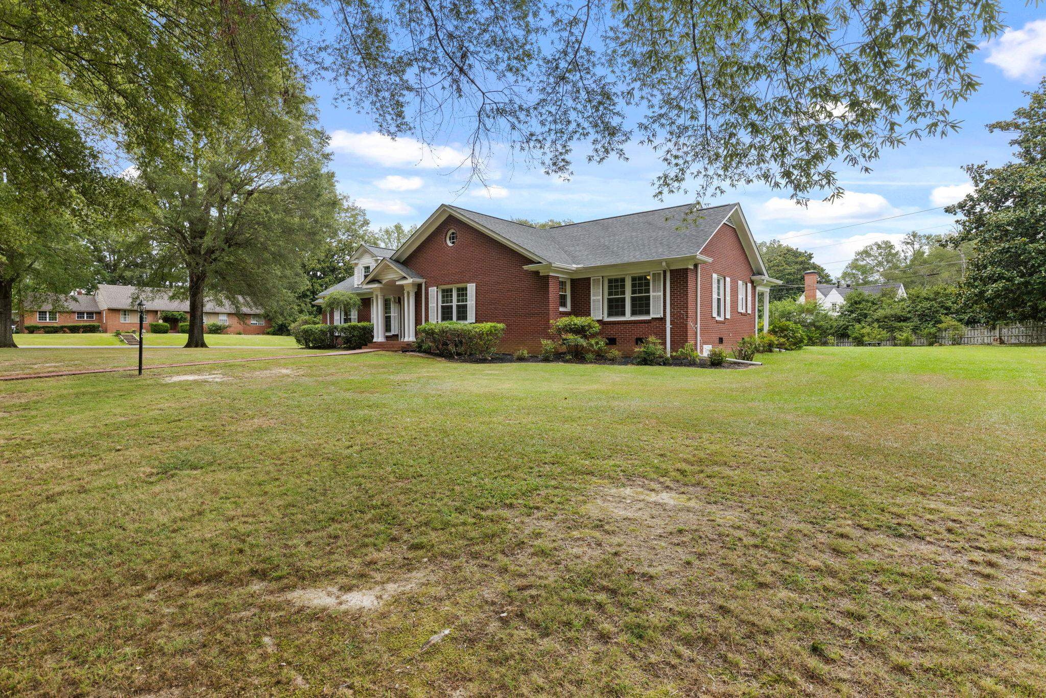 1906 Willow Road Corinth, MS 38834 - Photo 32 of 40 a big house with a big yard and large trees