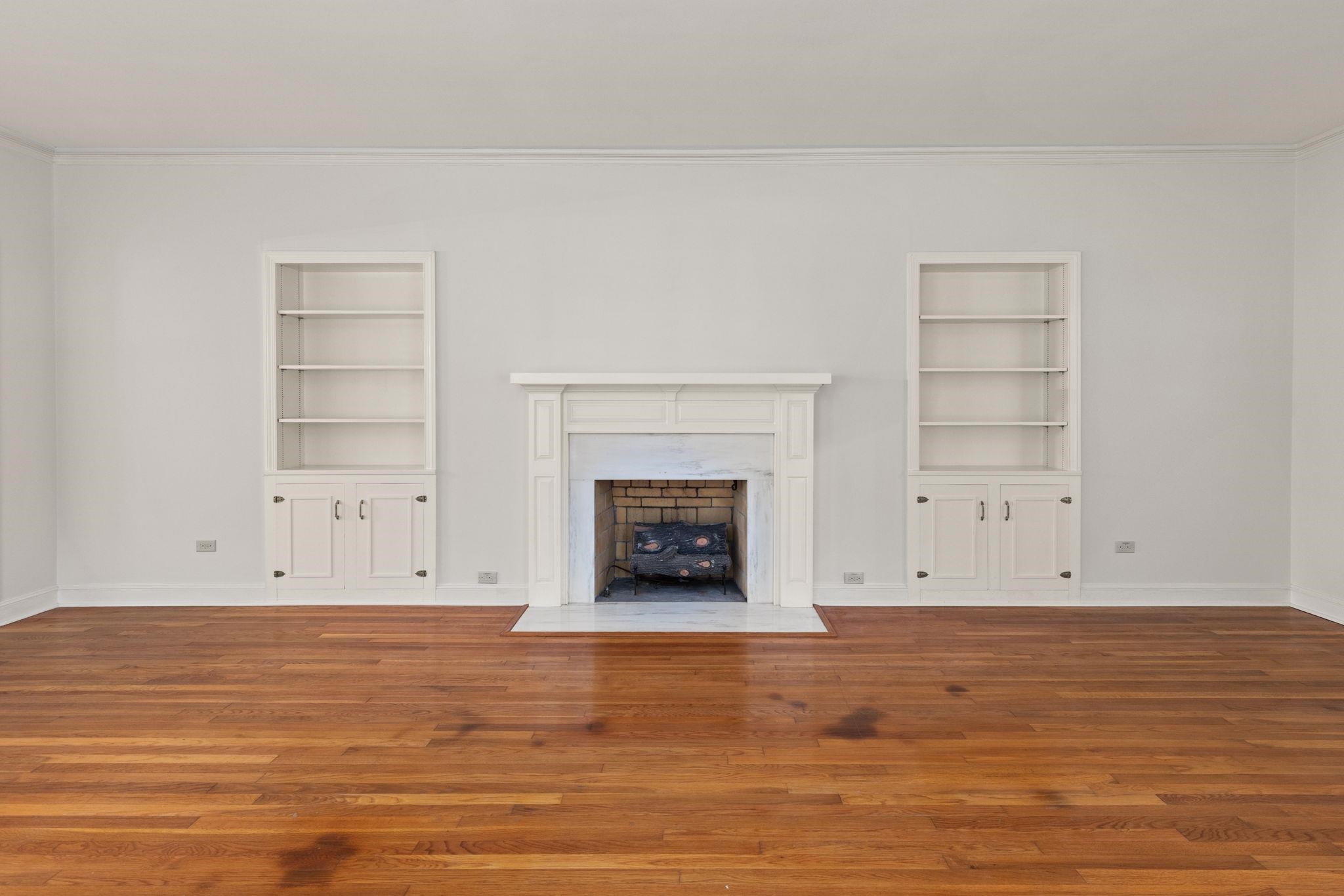 1906 Willow Road Corinth, MS 38834 - Photo 4 of 40 an empty room with a fireplace