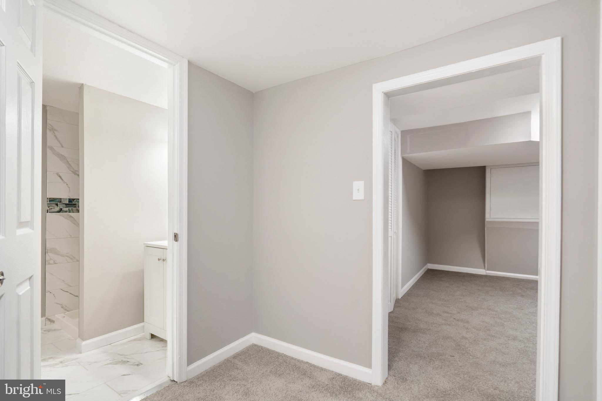 4009 Chatham Road Baltimore, MD 21207 - Photo 31 of 36 Lower Level Bathroom and Bedroom