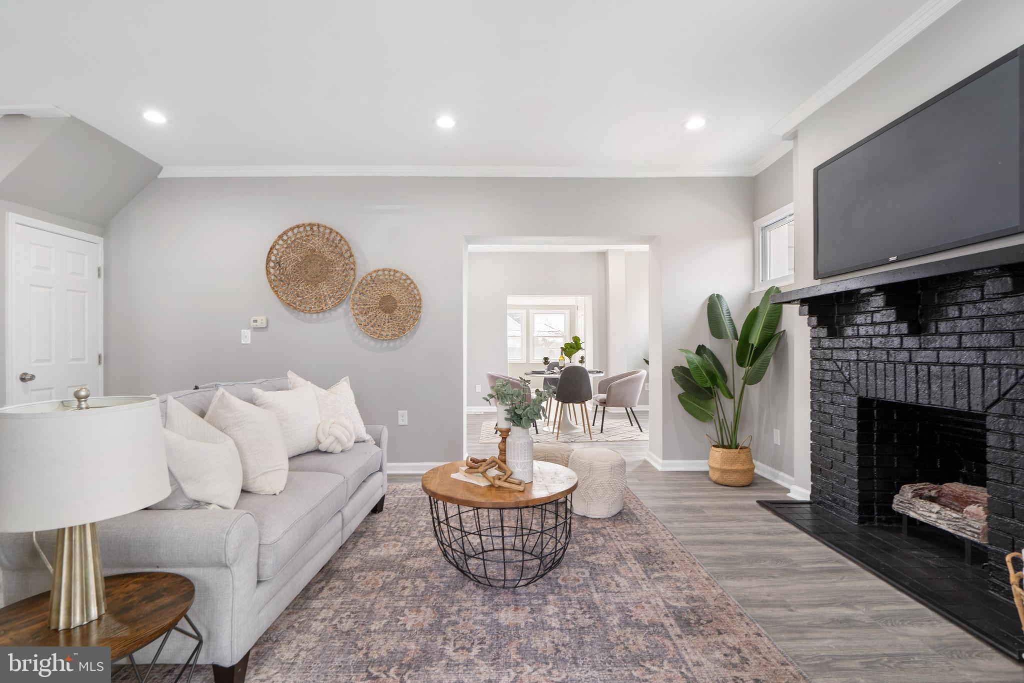 4009 Chatham Road Baltimore, MD 21207 - Photo 5 of 36 Cozy Up by the Fireplace