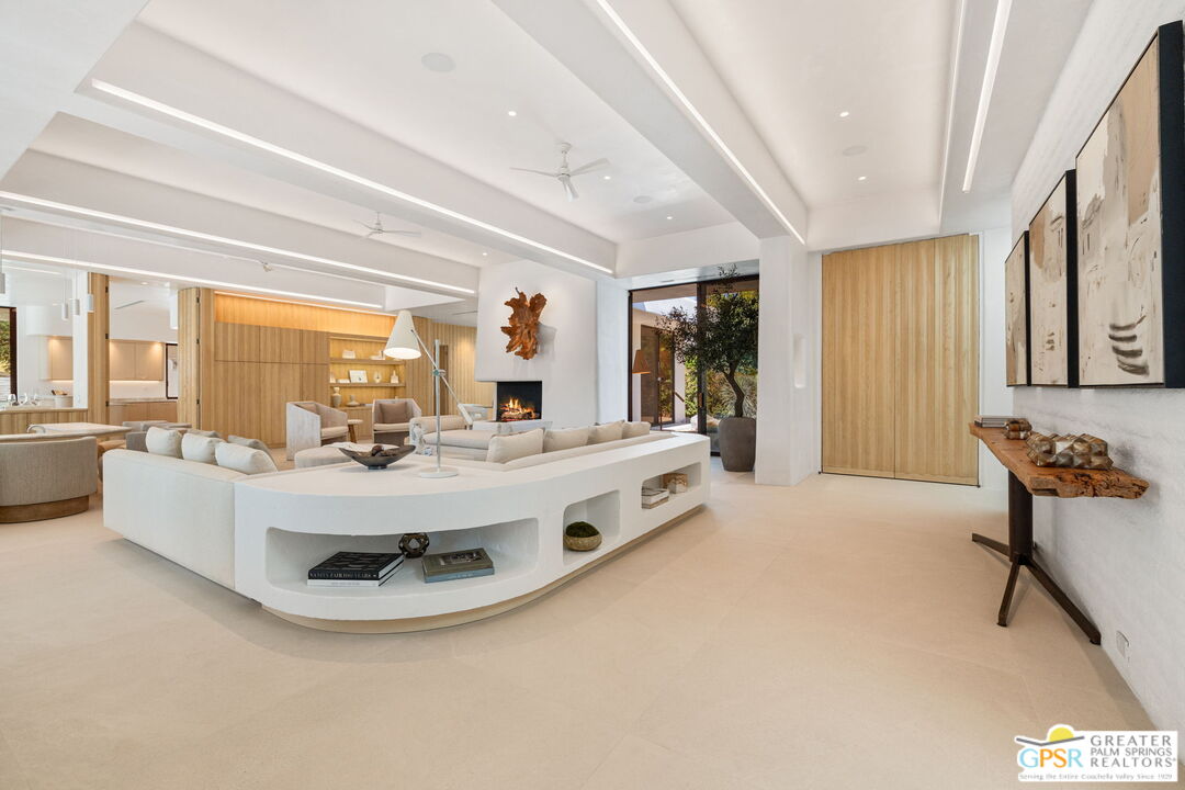 71000 Tamarisk Lane Rancho Mirage, CA 92270 - Photo 16 of 58 a view of living room with furniture and large windows