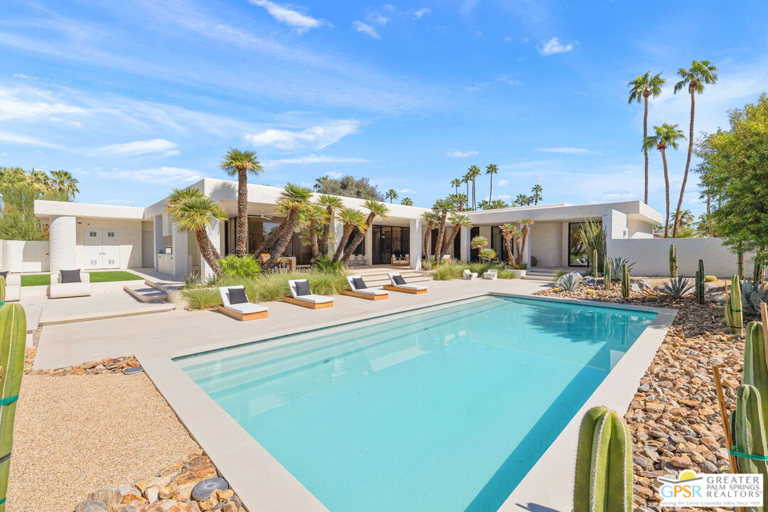 71000 Tamarisk Lane Rancho Mirage, CA 92270 - Photo 34 of 58 a view of a swimming pool with a patio