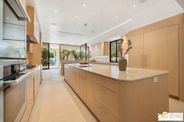 a spacious bathroom with a tub shower and sink