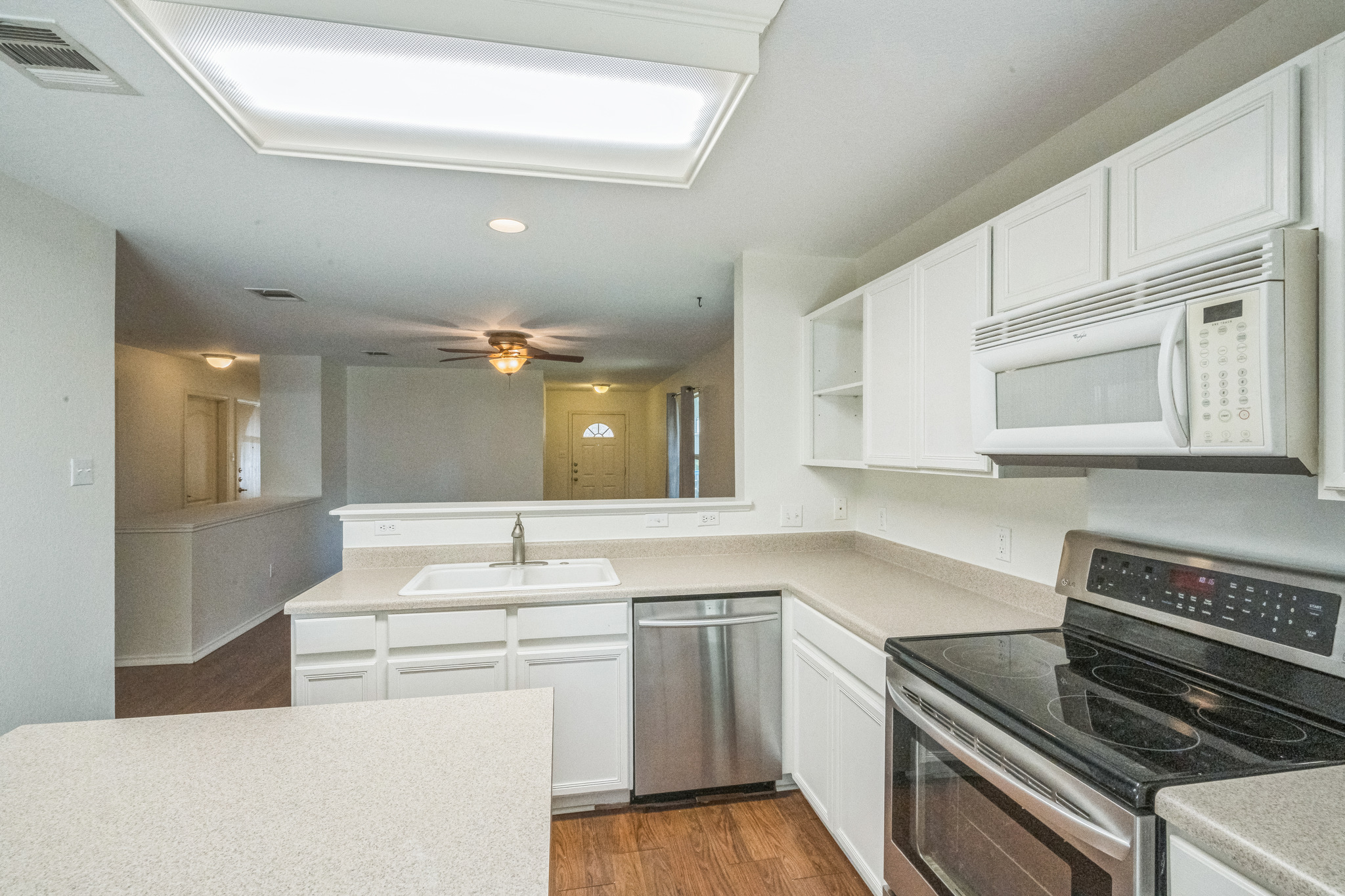 77 Jan Lane Georgetown, TX 78626 - Photo 8 of 16 A well-equipped kitchen boasts clean lines and an inviting open concept to adjacent living spaces.