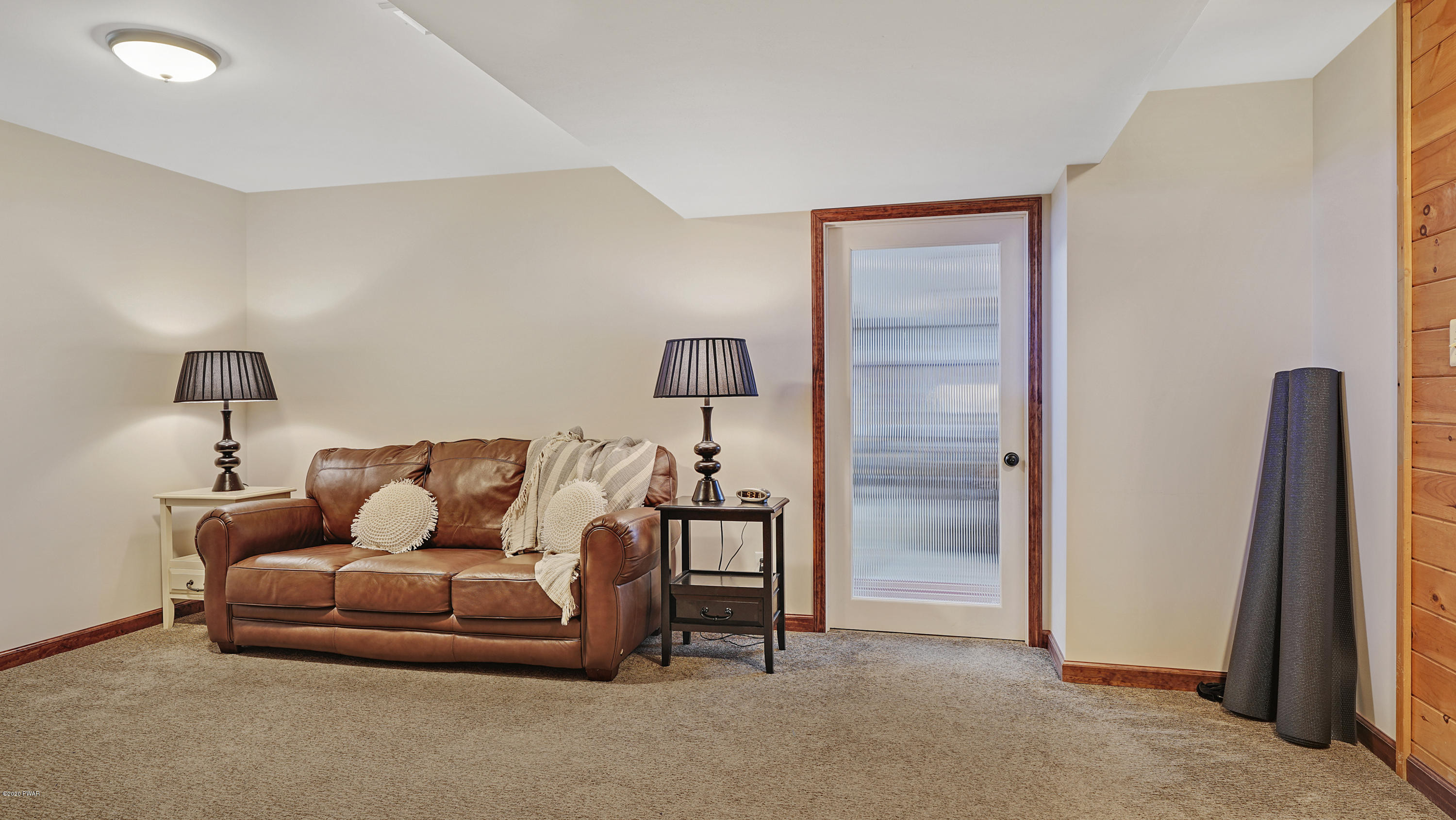 161 J J Road Moscow, PA 18444 - Photo 66 of 73 a bedroom with a bed and a couch