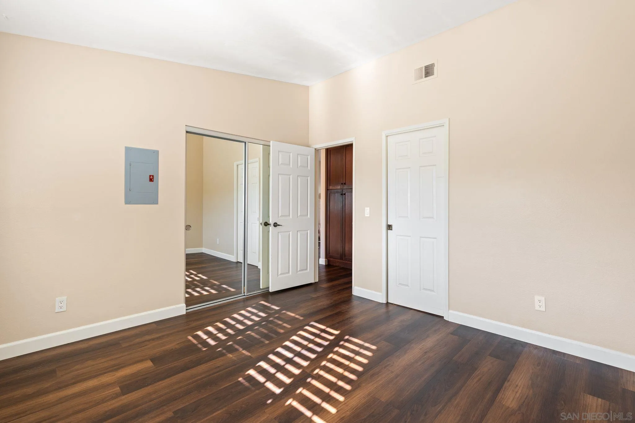 6922 Pear Tree Drive Carlsbad, CA 92011 - Photo 23 of 44 a view of an empty room