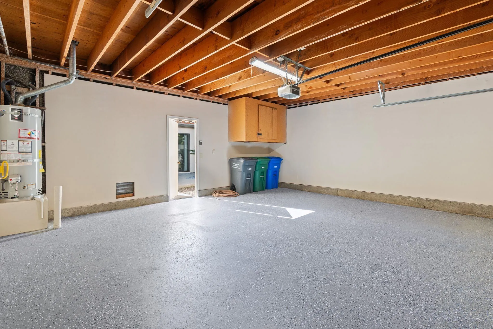 6922 Pear Tree Drive Carlsbad, CA 92011 - Photo 28 of 44 a view of empty room with wooden walls