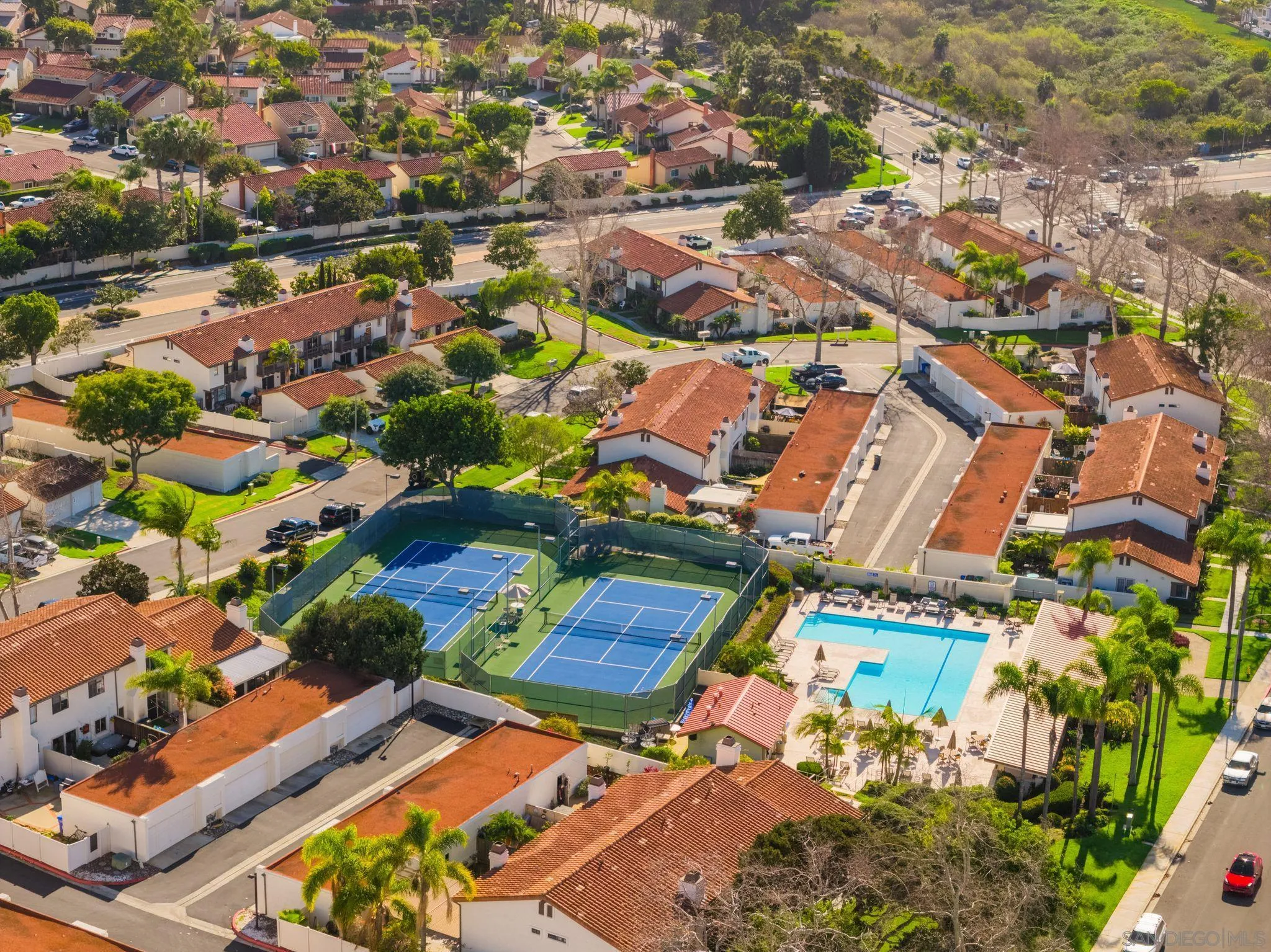 6922 Pear Tree Drive Carlsbad, CA 92011 - Photo 32 of 44 an aerial view of residential houses with outdoor space