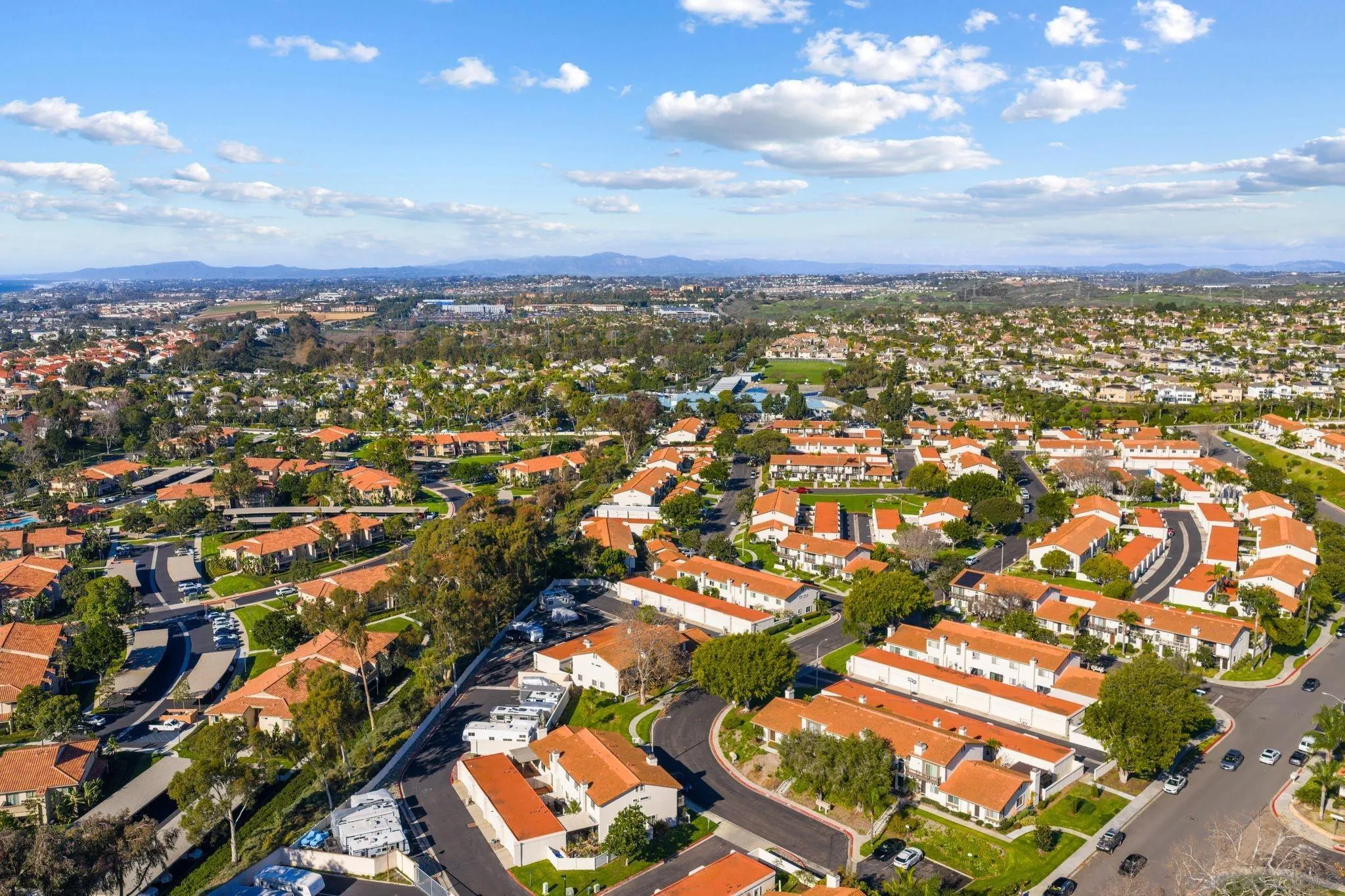 6922 Pear Tree Drive Carlsbad, CA 92011 - Photo 33 of 44 an aerial view of residential houses with outdoor space
