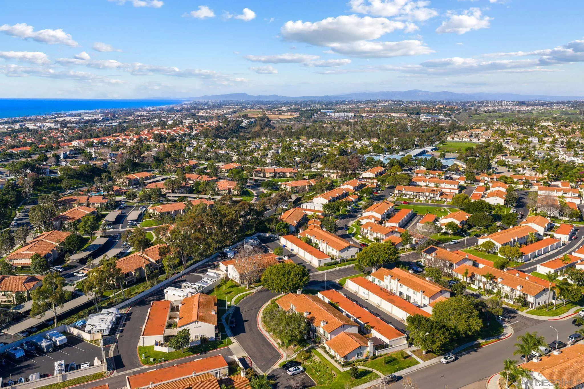 6922 Pear Tree Drive Carlsbad, CA 92011 - Photo 38 of 44 an aerial view of city and lake