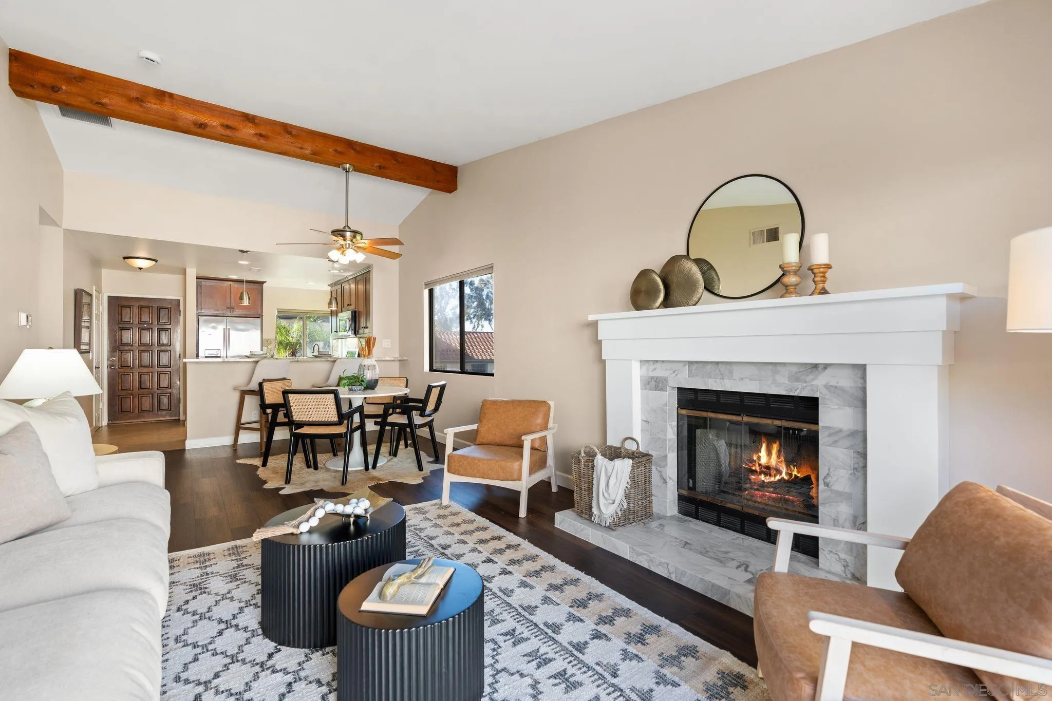 6922 Pear Tree Drive Carlsbad, CA 92011 - Photo 4 of 44 a living room with furniture and a fireplace