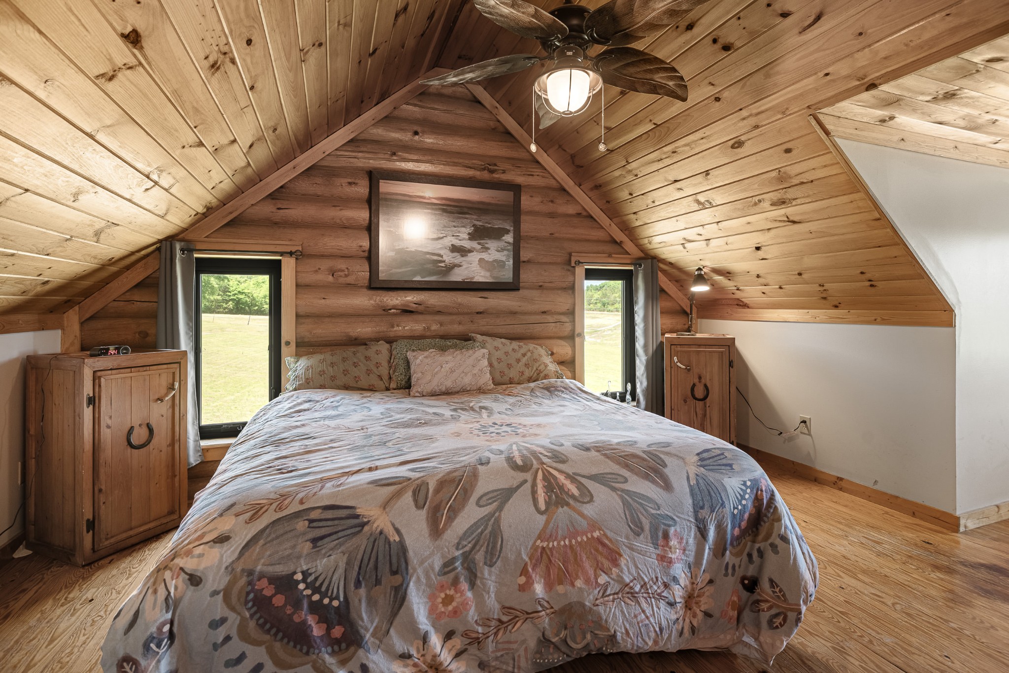642 Beach Bottom Road Watertown, TN 37184 - Photo 25 of 48 a bed sitting in a bedroom next to a window