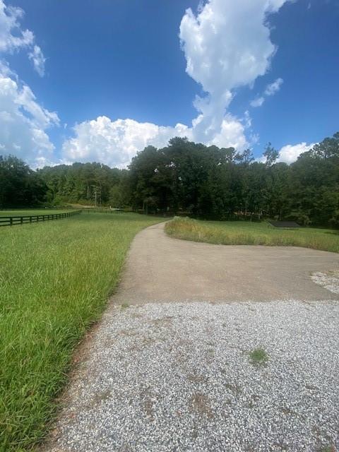1764 Flatbottom Road Ball Ground, GA 30107 - Photo 2 of 5 a view of an outdoor space and a yard