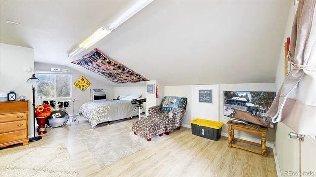 a room with a sink and a mirror