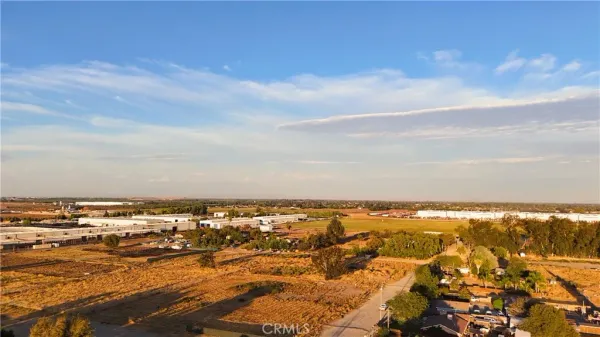 an aerial view of residential building and ocean