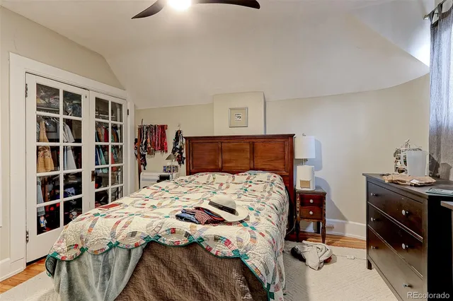 a bedroom with a bed and closet