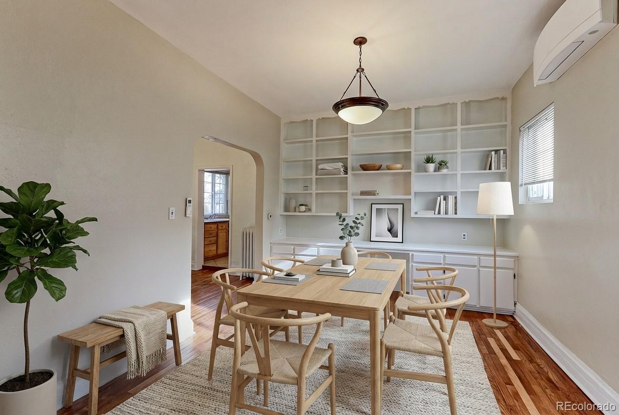 4574 Stuart Street Denver, CO 80212 - Photo 15 of 43 a view of a dining room with furniture window and wooden floor