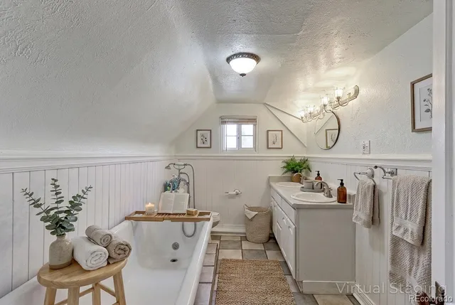 a very nice looking dining room with a table and chairs in it