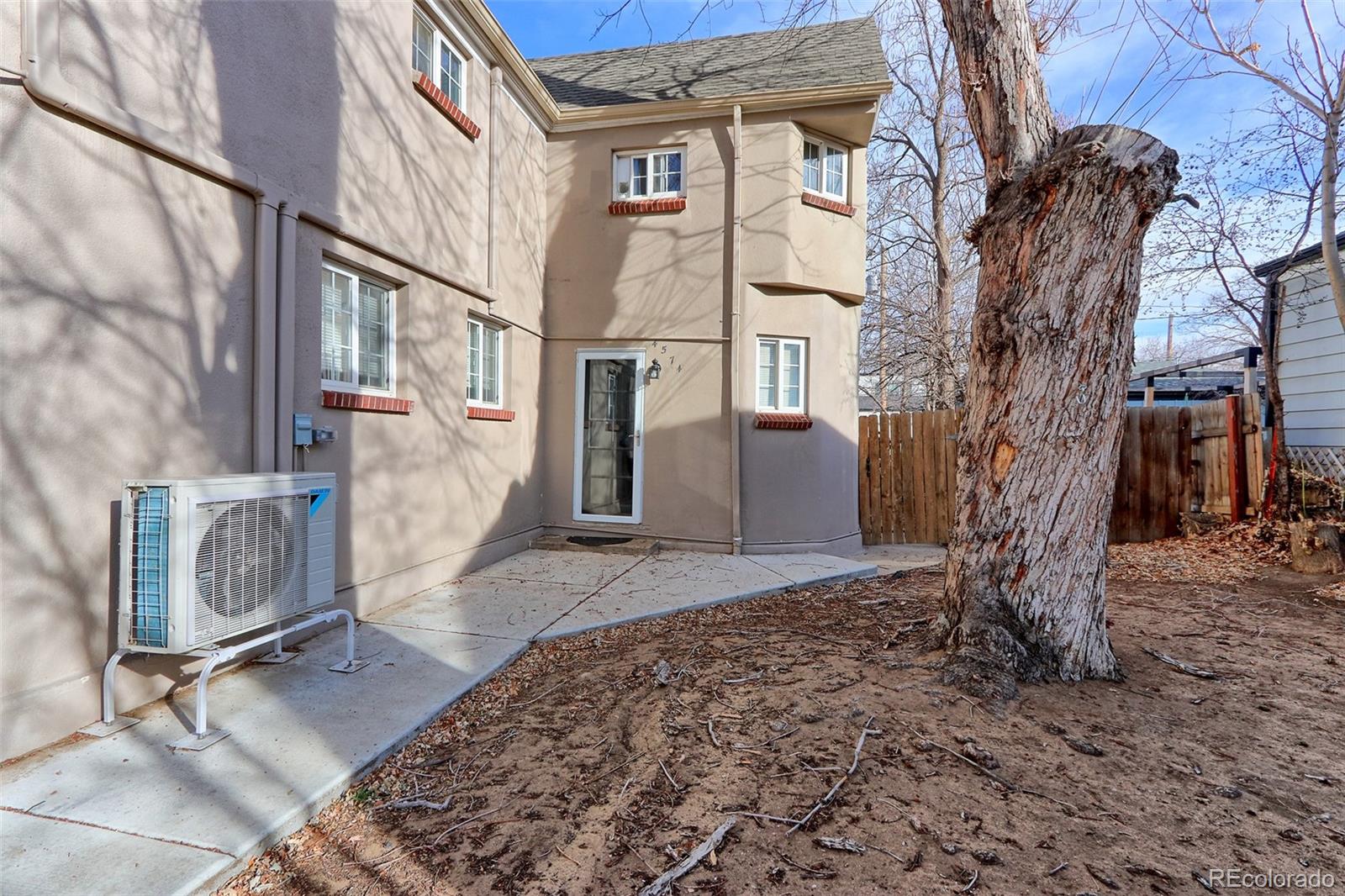 4574 Stuart Street Denver, CO 80212 - Photo 43 of 43 a view of a house with a yard