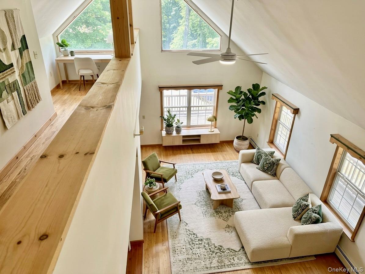 176 Downing Road Pleasant Valley, NY 12569 - Photo 4 of 31 Virtually staged Living area and loft for design potential.