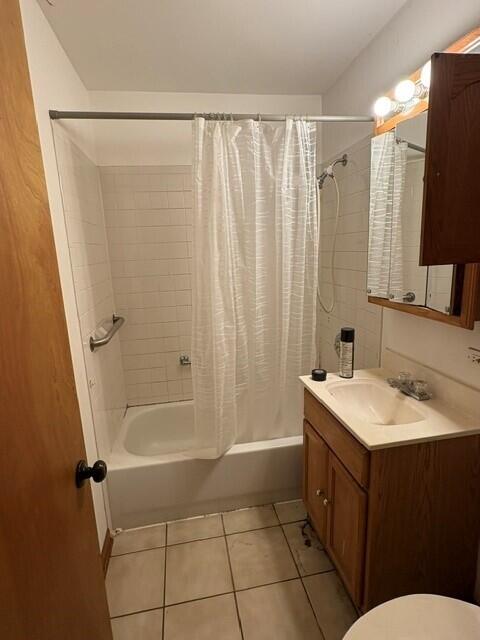 3320 163rd Street Hammond, IN 46323 - Photo 4 of 10 a bathroom with a sink a toilet and shower