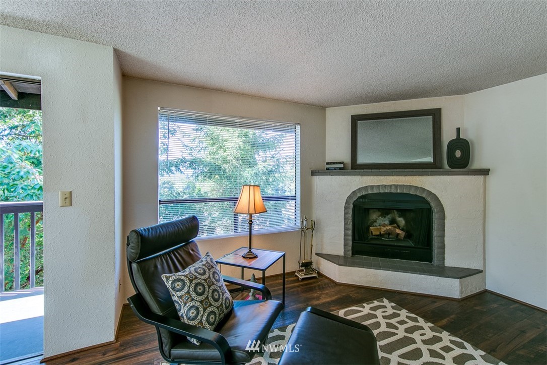 705 Sheridan Road Bremerton, WA 98310 - Photo 3 of 25 a living room with furniture and a fireplace