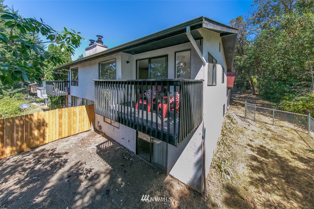 705 Sheridan Road Bremerton, WA 98310 - Photo 22 of 25 a view of a house with wooden fence