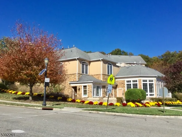 front view of a house with a street