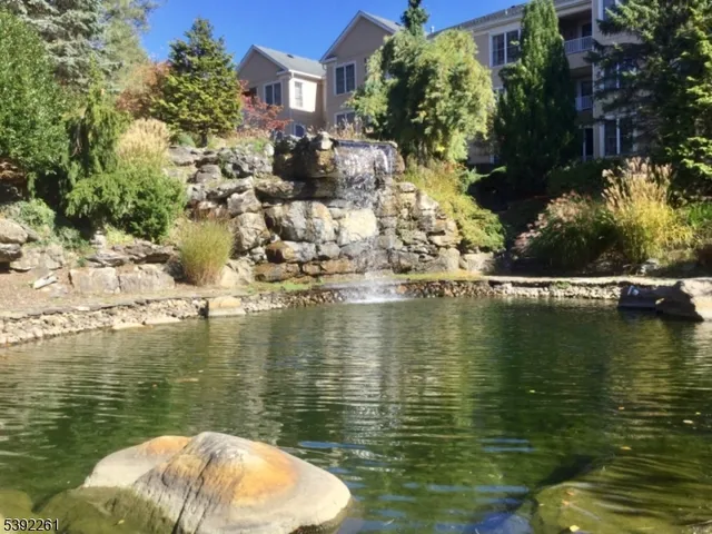 a view of a lake with a house