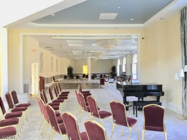 a view of a fountain in front of house