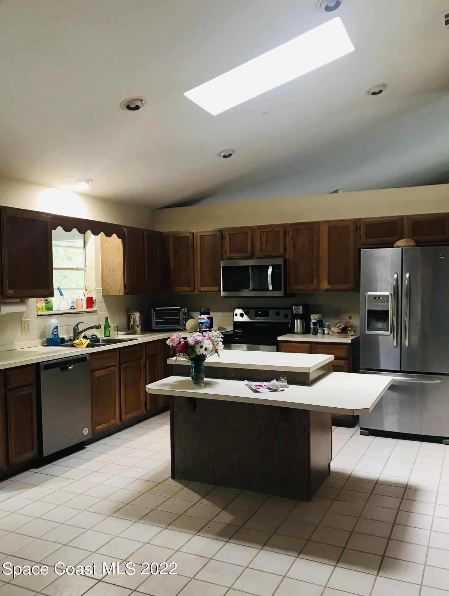 200 Southeast Rios Court Palm Bay, FL 32909 - Photo 6 of 18 open Kitchen