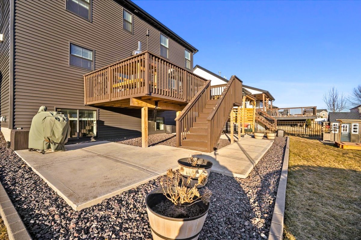 2625 Shale Road Normal, IL 61761 - Photo 11 of 60 a view of a balcony with two chairs and a potted plant