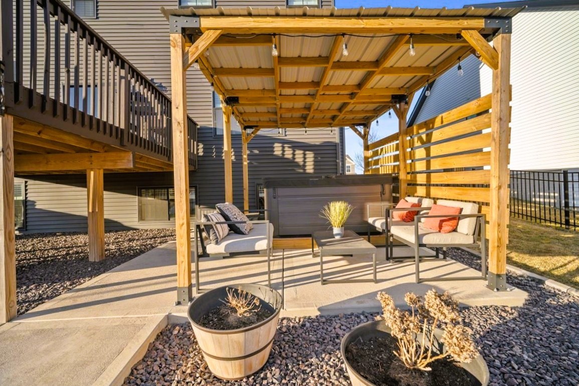2625 Shale Road Normal, IL 61761 - Photo 13 of 60 a patio with water fountain and outdoor seating