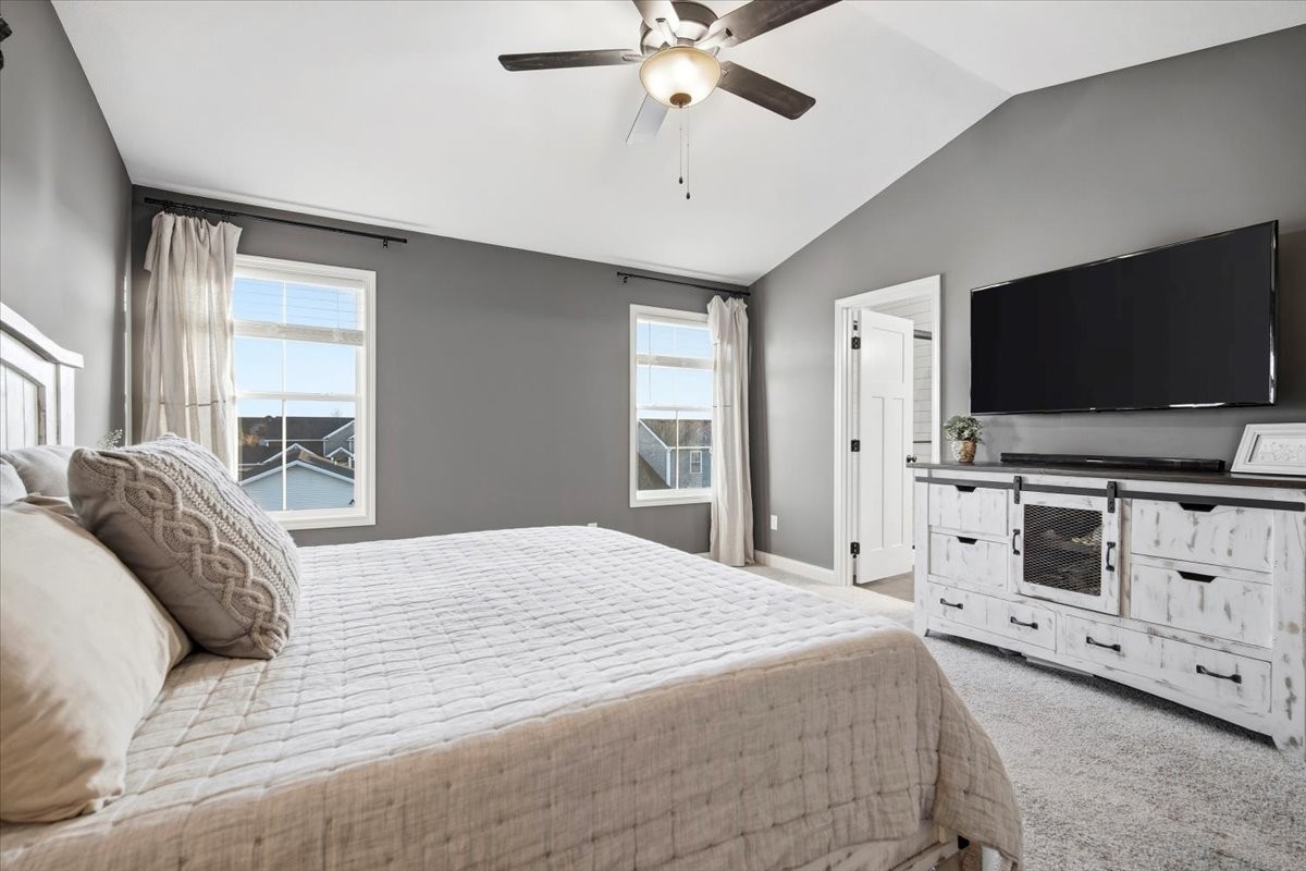 2625 Shale Road Normal, IL 61761 - Photo 42 of 60 a bedroom with a bed flat screen tv and a window