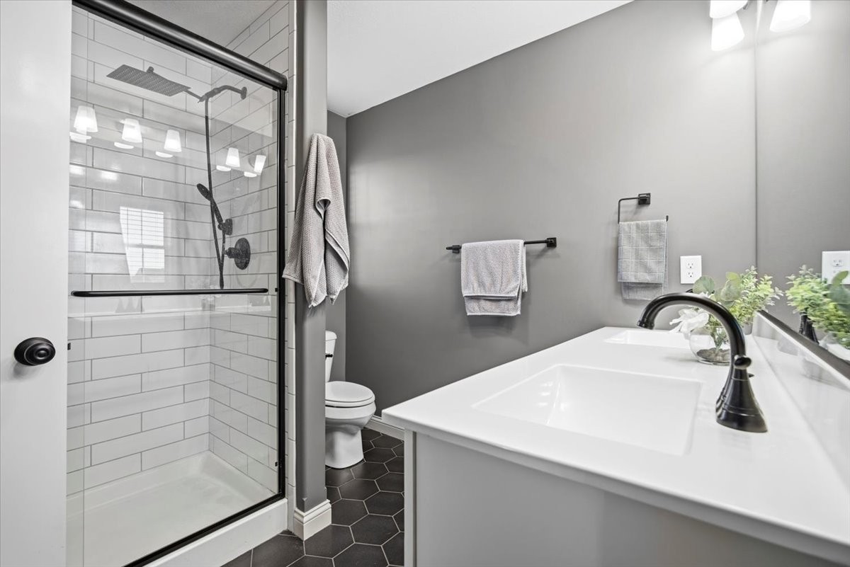 2625 Shale Road Normal, IL 61761 - Photo 43 of 60 a bathroom with a sink and mirror
