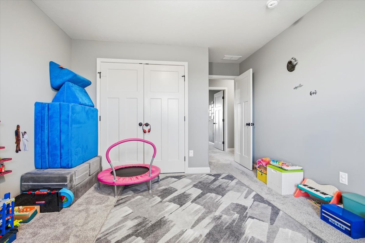 2625 Shale Road Normal, IL 61761 - Photo 50 of 60 a bedroom with furniture and a wooden floor