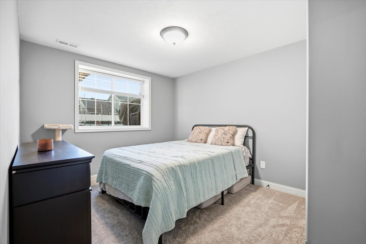 2625 Shale Road Normal, IL 61761 - Photo 60 of 60 a bedroom with a bed and a window