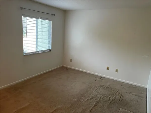 an empty room with a window