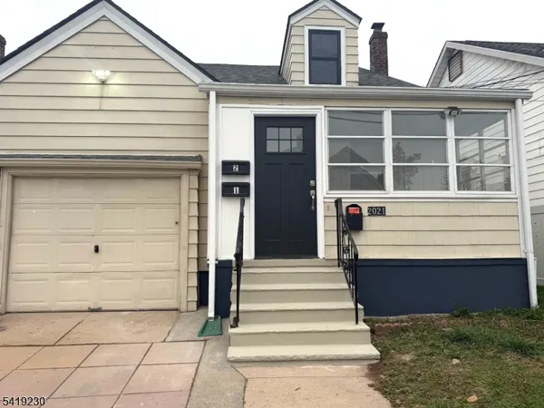 a front view of a house with a window