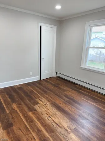 wooden floor and window in a room
