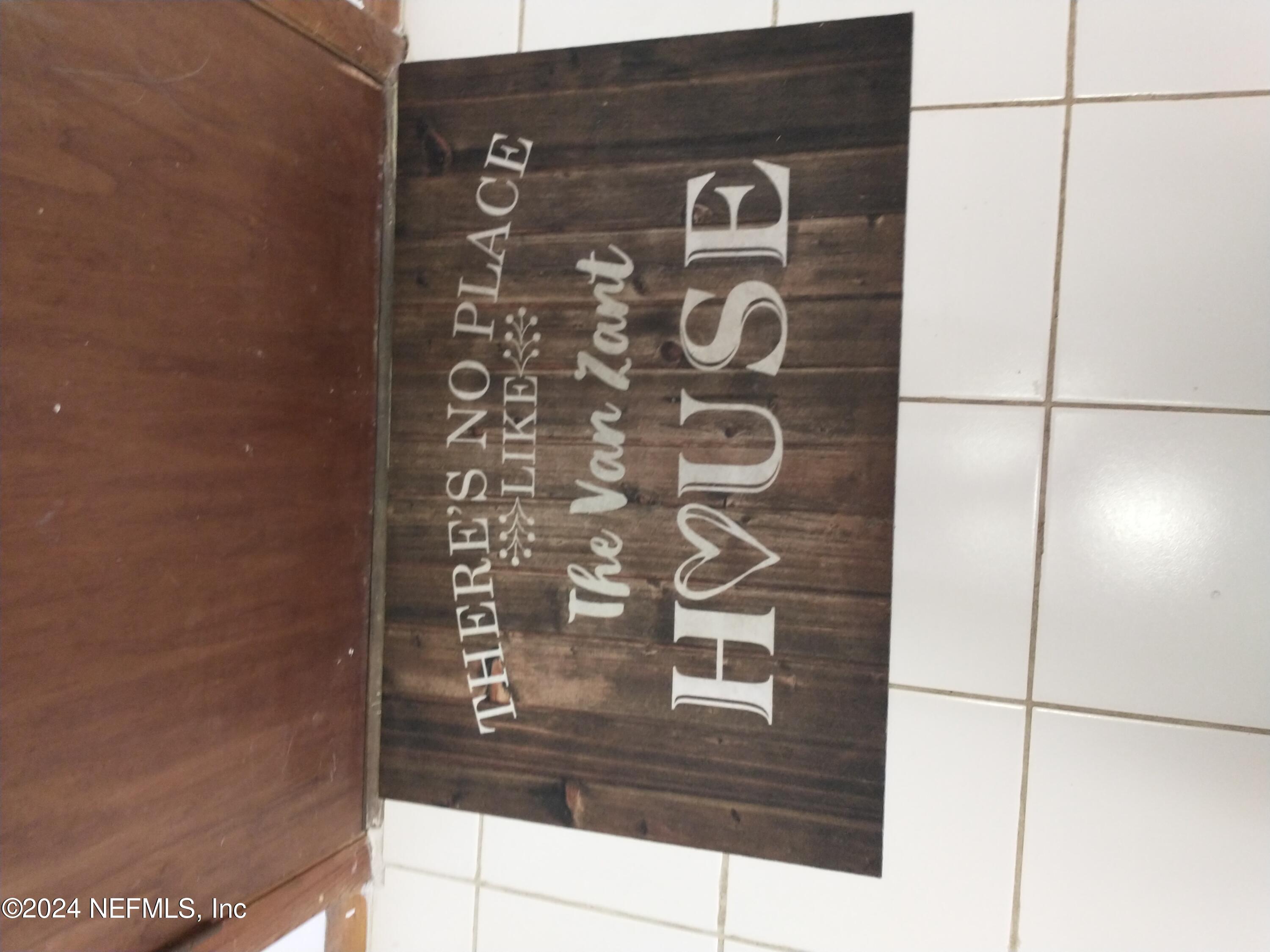 5419 Woodcrest Road Jacksonville, FL 32205 - Photo 17 of 25 a sign that is on the side of a building