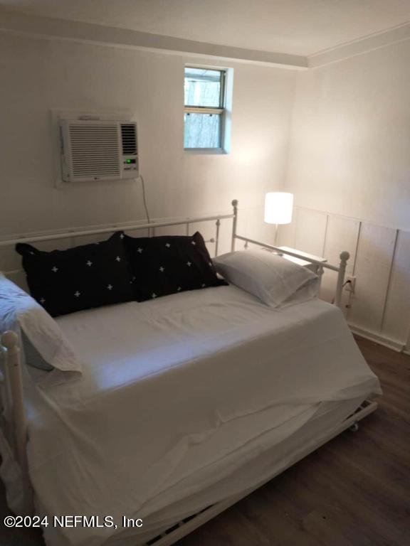 5419 Woodcrest Road Jacksonville, FL 32205 - Photo 19 of 25 a bedroom with a bed and a night stand