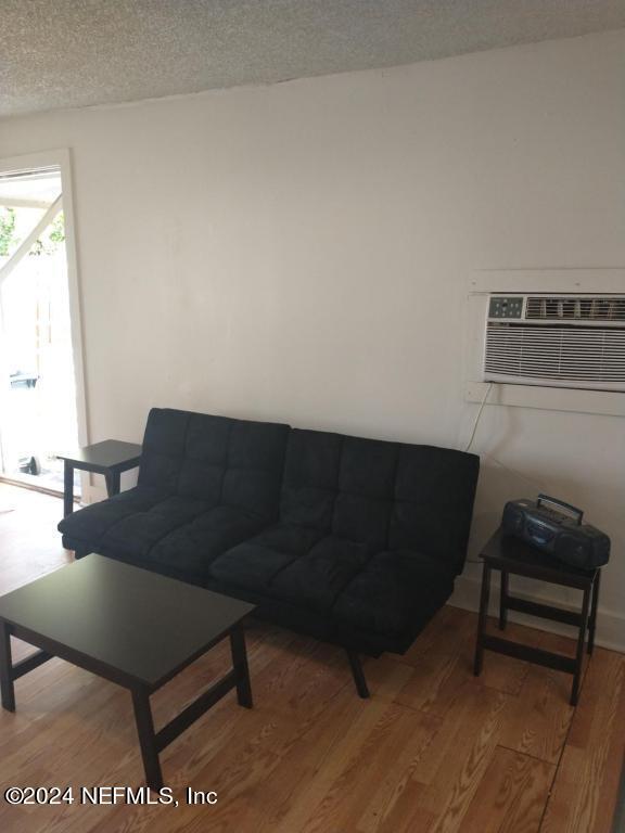 5419 Woodcrest Road Jacksonville, FL 32205 - Photo 23 of 25 a living room with furniture and a window