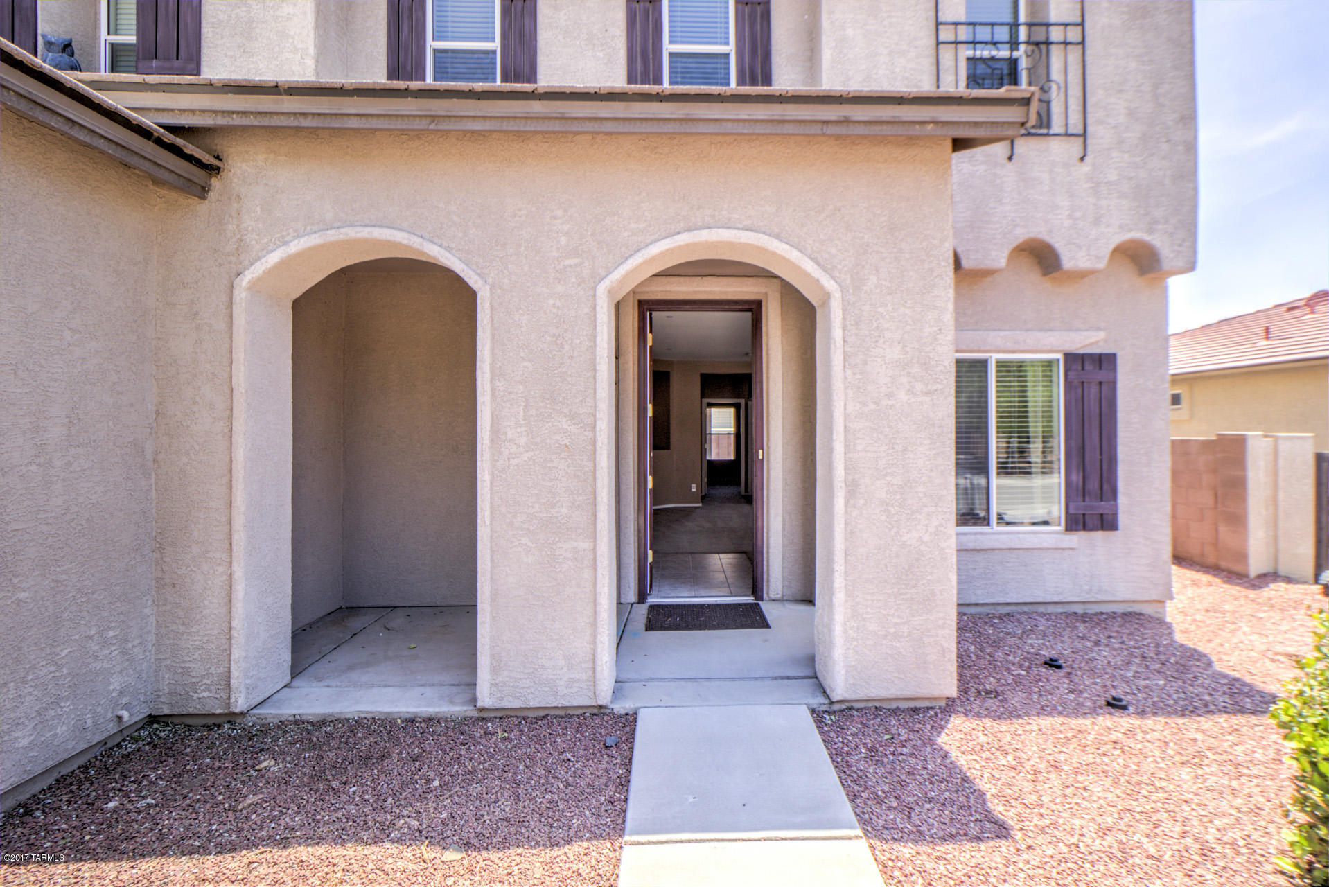 3588 East Mecate Road Tucson, AZ 85739 - Photo 2 of 36 a view of a entryway door of the house