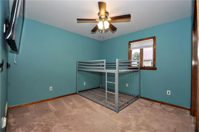 a room with closet and a chandelier