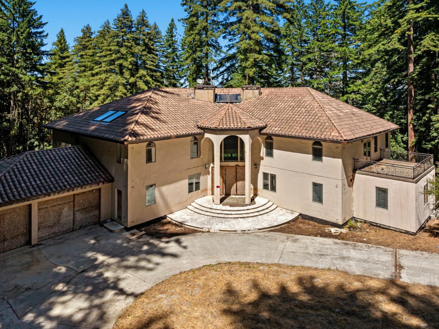 1 Reids Roost Road Woodside, CA 94062 - Photo 4 of 24 a aerial view of a house with a yard